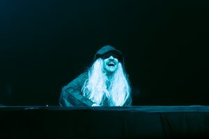 Lyny DJ-ing in a wizard costume